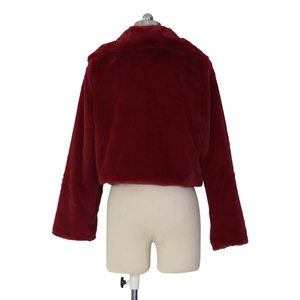 Back view of a burgundy faux fur jacket for women on a white mannequin torso