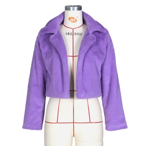 Detail of purple faux fur short jacket featuring a large collar on a white mannequin