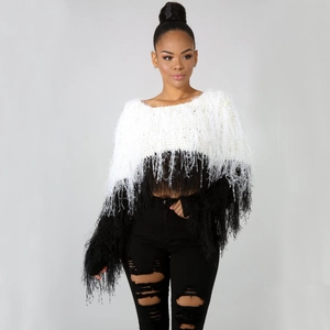 Detail of black and white shaggy knit sweater with long fringe and cropped round neck