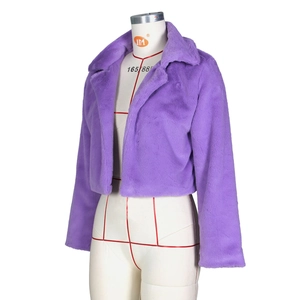 Detailed view of women's short faux fur jacket in purple with wide notched lapel