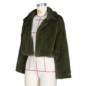 Detail of olive green faux fur jacket with oversized collar and plush texture