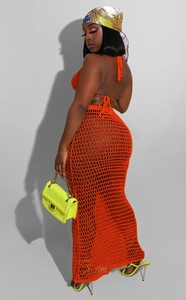 Detail of orange crochet mesh two-piece set featuring hollow knit texture and open back top
