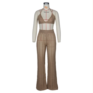 Detail of crochet knit texture on khaki halter top and flare pants two-piece set