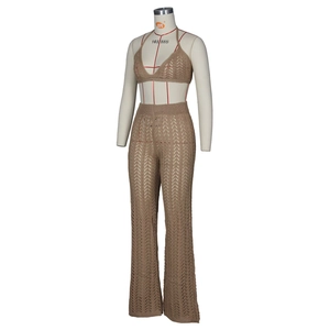 Detail of bohemian khaki crochet two-piece set featuring hollow-out knit patterns