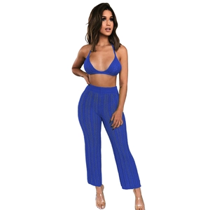 Detail of blue crochet two-piece set featuring wave texture knit and high waist pants