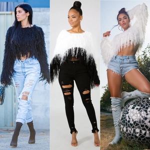 Women's crewneck knit sweater featuring ostrich feather fringe in black and white colors