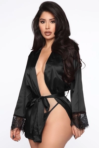 Close-up of elegant black satin robe featuring delicate eyelash lace trim on sleeves