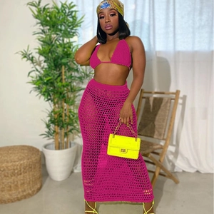 Pink knit crochet two-piece set with halter bikini top and mesh skirt for beach wear