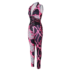 Detail of deep V-neck jumpsuit featuring leopard and gold chain prints with waist lacing
