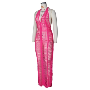 Detailed knit texture of a pink hollow-out crochet beach maxi dress on a white mannequin