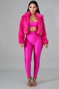Three-piece rose red set with faux fur jacket, cutout crop top and high-waisted leggings