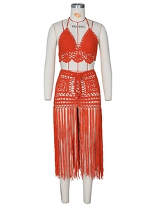 Häkel-Set für Damen in Orange mit Neckholder-Top und einem Rock mit langen Fransen