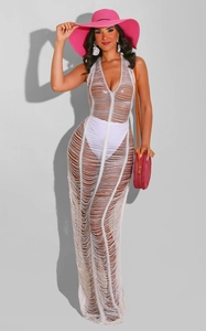 Detail showing the intricate horizontal cut-out texture of this white knitted beach cover-up