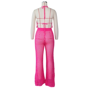 Detailed back view of rose red crochet two-piece set featuring hollow knit halter top