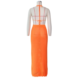 Detail view of the vibrant orange crochet knit set back design and hollow mesh texture