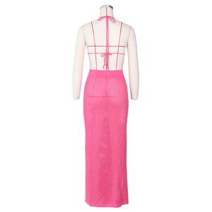 Back view of pink crochet two-piece beach set featuring hollow knit mesh and halter tie