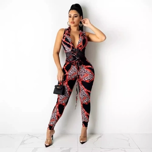 Women's deep V-neck sleeveless jumpsuit featuring leopard and chain print with waist ties