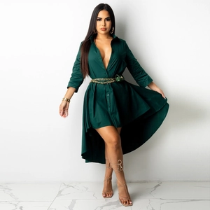 Deep green irregular hem shirt dress featuring a gold double chain belt and mini bag detail