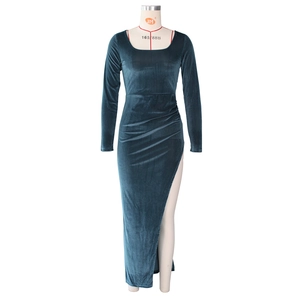 Detail of teal velvet dress showing the square neckline and lustrous texture