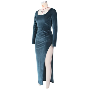 Detail view of square neck velvet maxi dress with high side slit and long sleeves