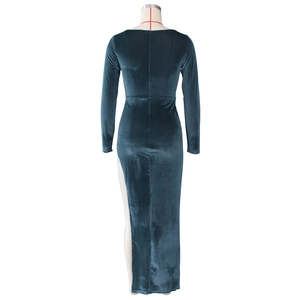Rear view of velvet maxi dress showing the zipper closure and thigh-high side slit