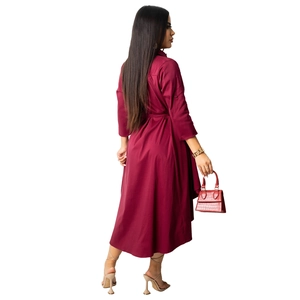 Women's burgundy long sleeve shirt midi dress with matching waist belt in back view