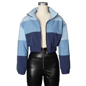 Women's chic gradient denim patchwork puffer jacket with blue color-blocking and stand collar