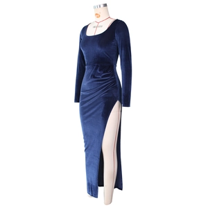 Detail view of the square neckline and ribbed velvet texture on navy blue maxi dress