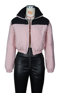 Detail of high collar and two-tone pink and black puffer jacket on mannequin