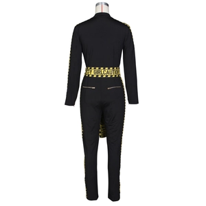 Detail of black sexy jumpsuit featuring yellow caution letter print tape on sleeves and back