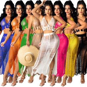 Women's sexy 2-piece crochet beach set with tassel halter top and hollow out maxi skirt