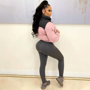 Women's pink and black puffer jacket with high waist ribbed pants for winter style