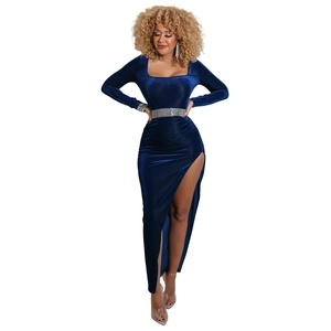 Detail of a dark blue velvet evening dress featuring a square neck and rhinestone belt