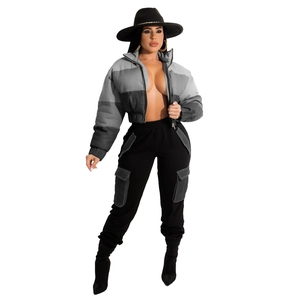 Detail view of women's gradient puffer jacket with stylish stand collar and cargo pants