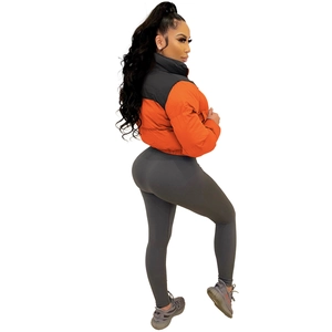 Women's cropped flight jacket in orange and black color block with high collar