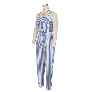 Detailed front view of blue and white striped strapless jumpsuit with zipper and flap pockets