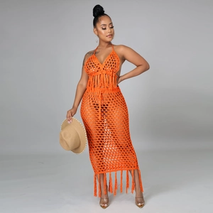 Ensemble de plage en crochet orange pour femme avec haut licou et jupe longue ajourée