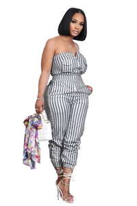Detail of grey striped strapless jumpsuit with zipper front and cargo pockets design