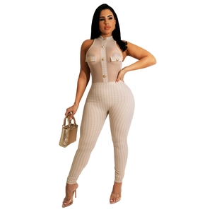 Detail of elegant mesh splicing sleeveless jumpsuit with houndstooth pattern and gold buttons