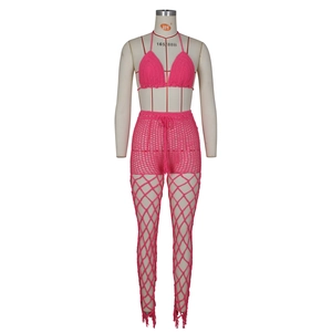 Three-piece bright pink crochet beach set with halter bikini and hollow-out mesh pants
