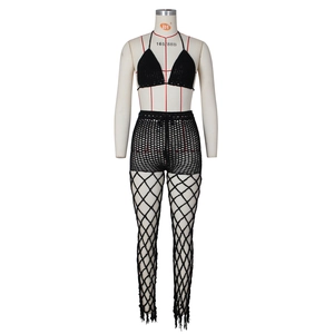 Detail view of black crochet 3-piece set featuring hollow-out knit pattern on mannequin