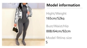 Detail view of women's metallic silver puffer jacket with a ribbed gray bodysuit