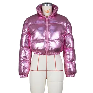 Detail of metallic shiny pink puffer jacket with stand collar and zip closure