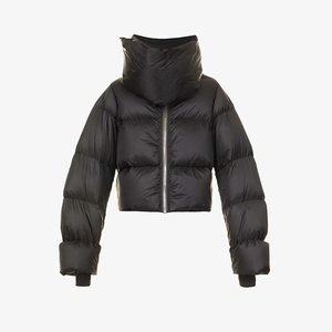 Detail of black puffer jacket showing high funnel collar and quilted texture