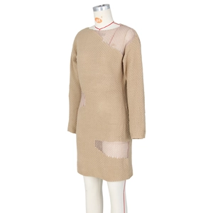 Detail of khaki crochet knit dress featuring intricate hollow out mesh stitching on mannequin