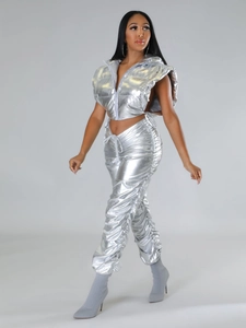 Close-up of metallic silver hooded vest and drawstring ruched pants with shiny texture