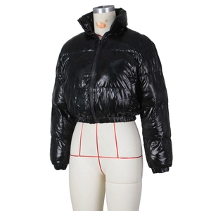Detailed view of women's short black glossy puffer jacket with stand collar design