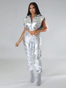Detail of silver metallic cropped puffer vest and drawstring joggers two-piece set