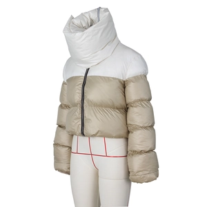Detail of the high collar windproof design and color-block stitching on the puffer jacket