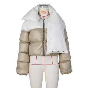 Detail of winter puffer jacket with large scarf collar and khaki white contrast color